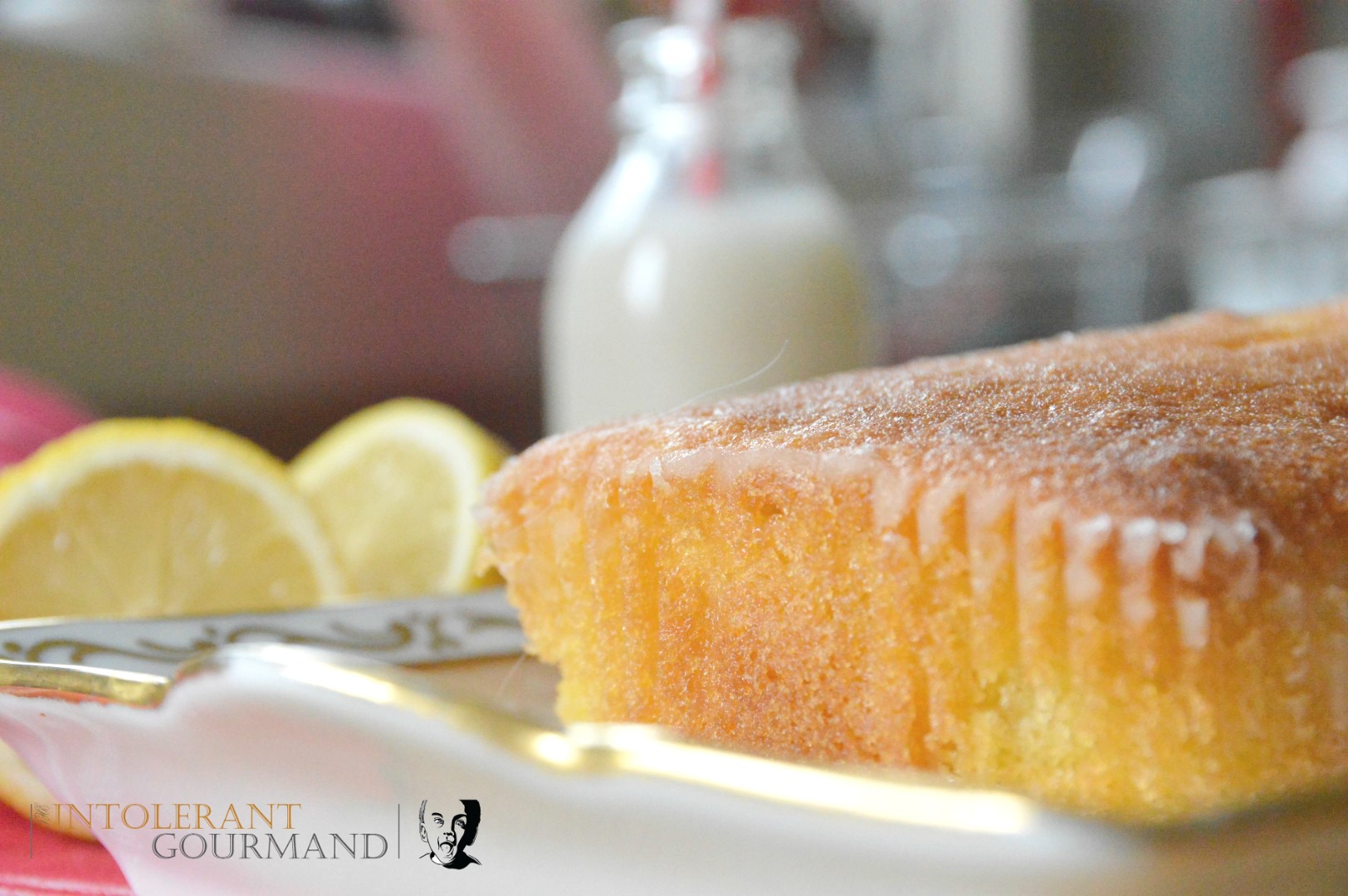 Gluten free dairy free lemon drizzle cake - a delicious light sponge, made with Free From Fairy flour www.intolerantgourmand.com