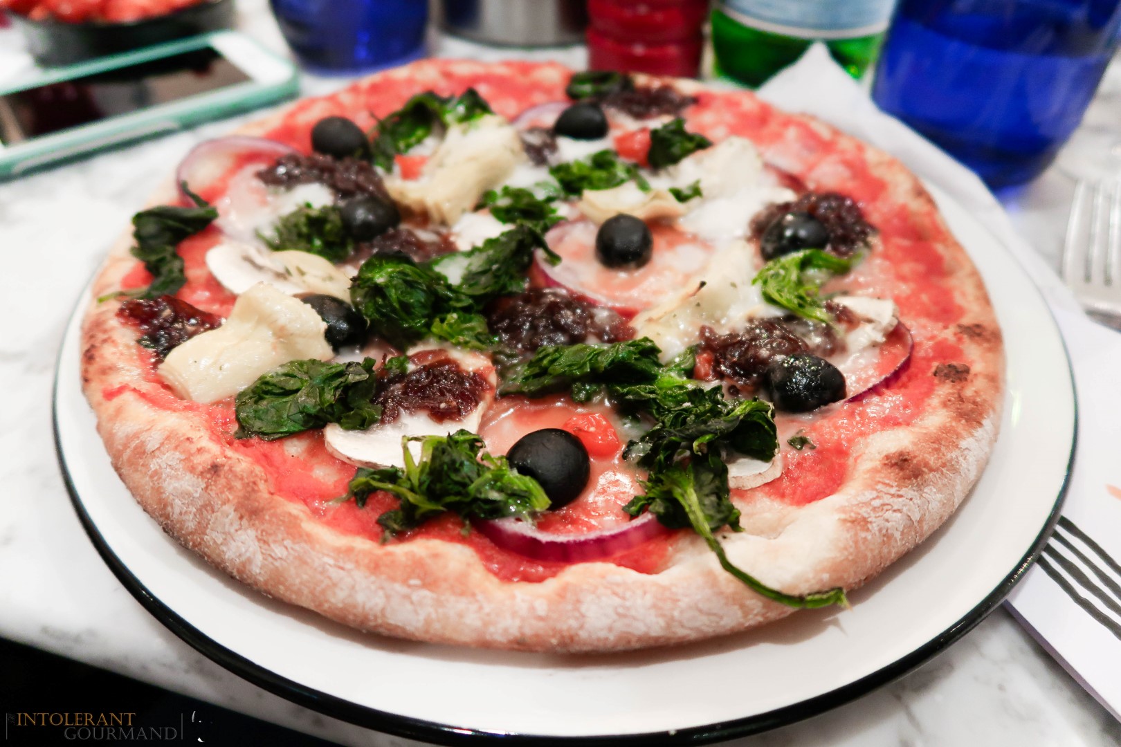 Vegan Cheese Pizza Express - The 1st vegan pizza party at Pizza Express held at their flagship venue on Gloucester Road, London! Their vegan cheese behaves in the same way as 'normal' cheese, and melts beautifully, and tastes great! www.intolerantgourmand.com